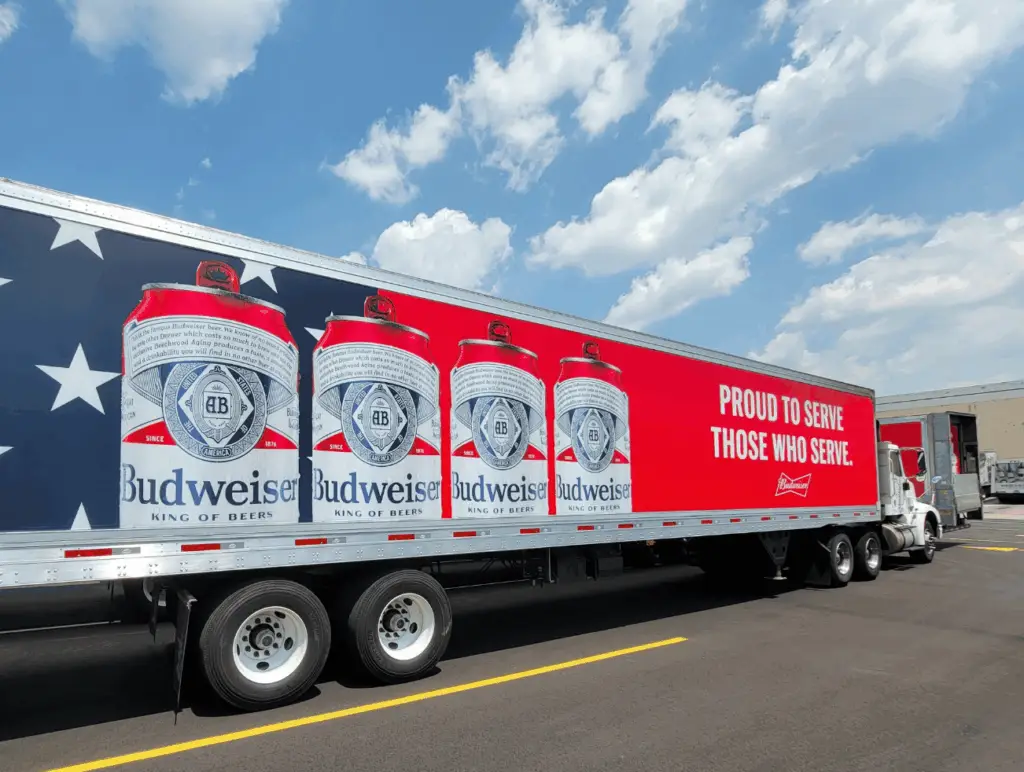 Full wrap truck pulling in to loading dock